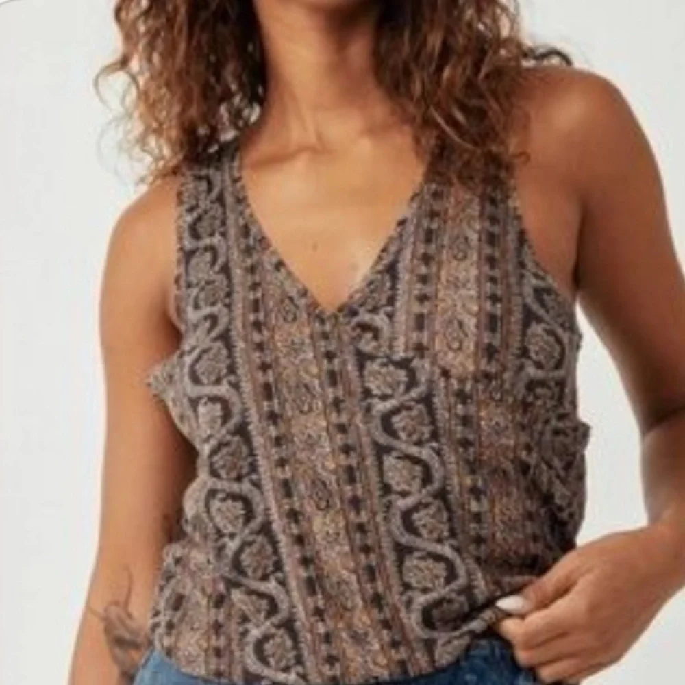 Free people Your twisted tee  XL, black version. NWT